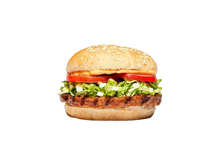A classic hamburger with a sesame seed bun, grilled beef patty, fresh lettuce, tomato slices, and a drizzle of mustard sauce, isolated on a solid black background.